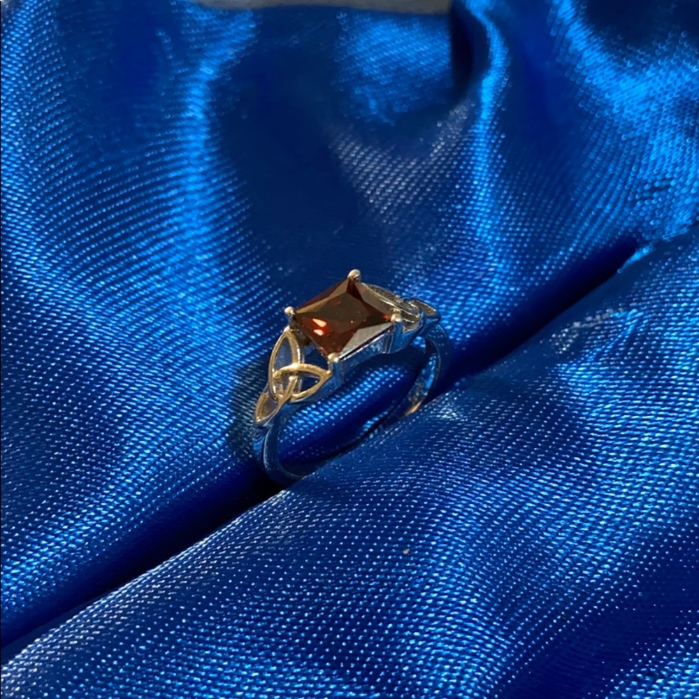 Sterling silver Celtic garnet princess cut ring